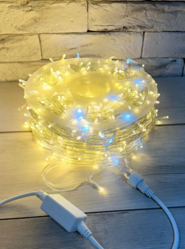 Гирлянда уличная светодиодная нить 100 метров 800 LED 220V с мерцанием (прозрачный провод каучук)