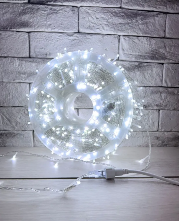 Гирлянда уличная светодиодная нить 100 метров 800 LED 220V с мерцанием (прозрачный провод каучук)